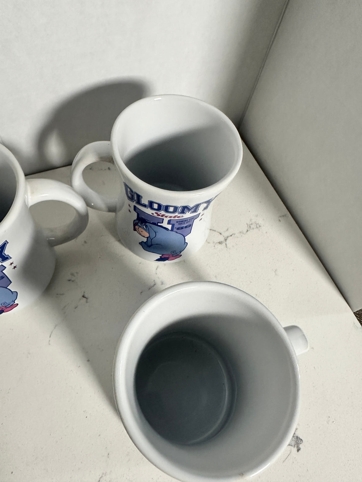 Disney Store Eeyore “Gloomy State U” Mugs Set of 4 – Winnie the Pooh – 4.5" Tall