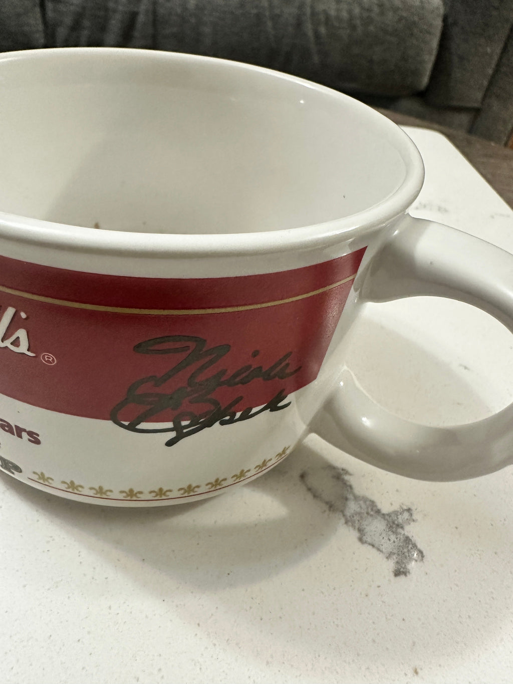 The Collected Chapter 1998 Campbell’s Soup oversized ceramic mug featuring figure skater signatures in red and white.