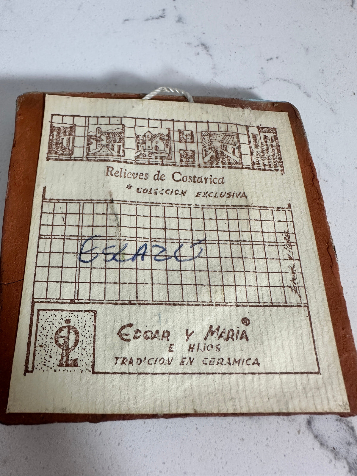 The Collected Chapter vintage Costa Rica ceramic wall plaque back with original paper label and hanging loop