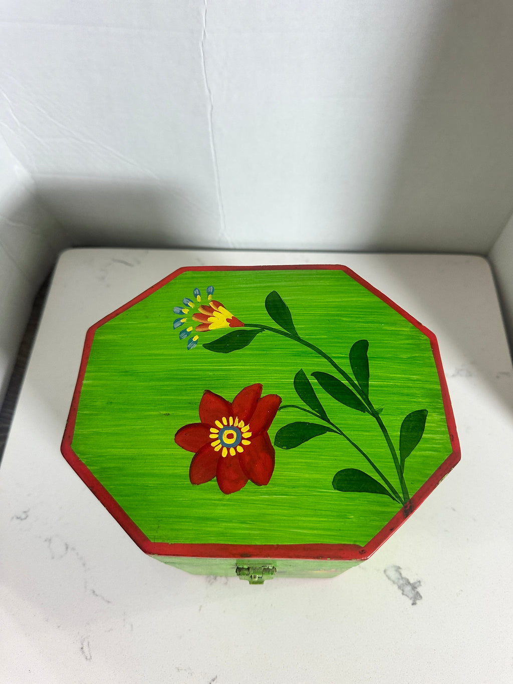 The Collected Chapter vintage octagonal wooden keepsake box with lime-green finish and hand-painted floral folk art.
