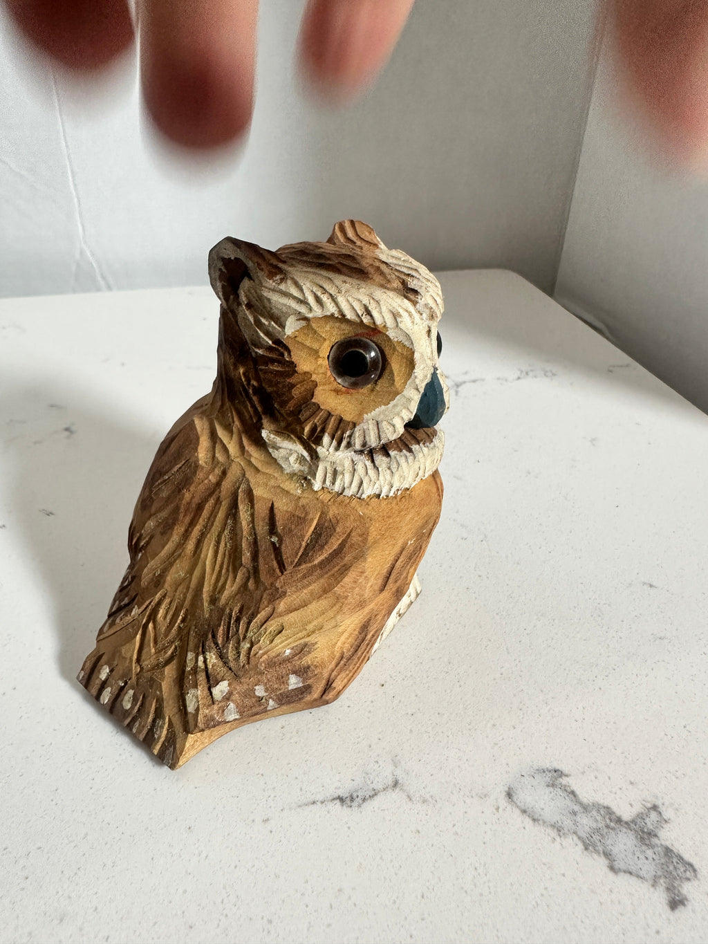 The Collected Chapter vintage hand-carved wooden owl figurine with detailed feather texture and large round eyes.