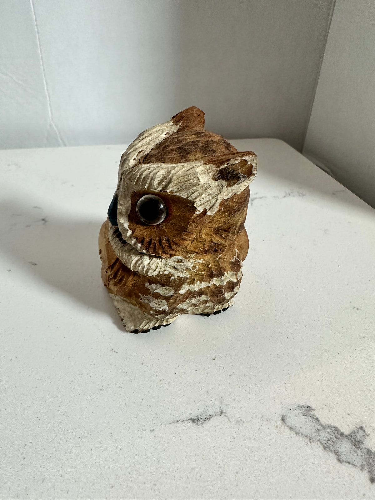 The Collected Chapter vintage hand-carved wooden owl figurine with textured brown feathers and cream-toned face.