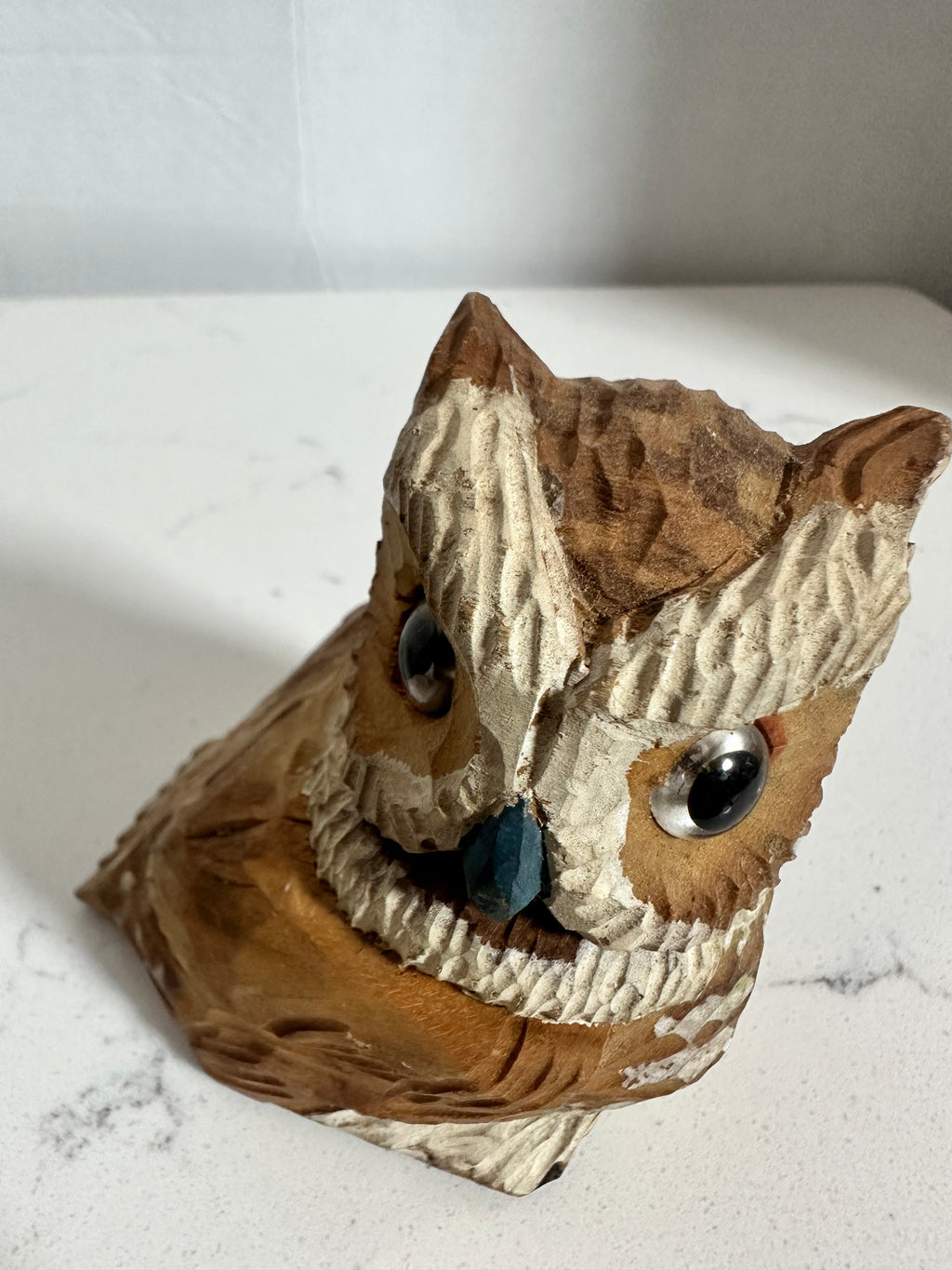 The Collected Chapter vintage hand-carved wooden owl figurine with textured brown feathers and cream-toned face.