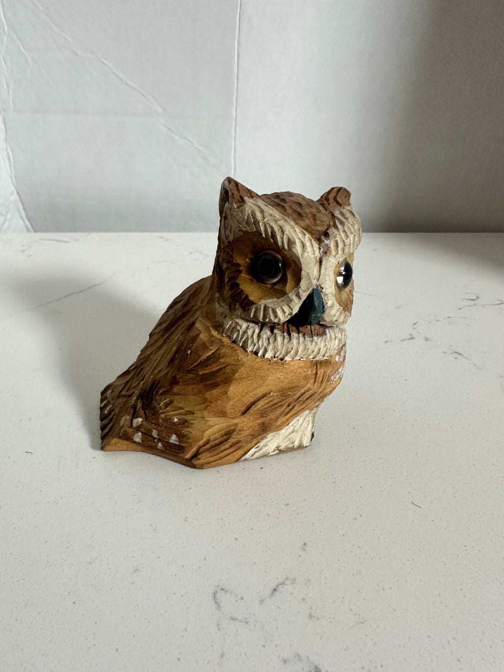 The Collected Chapter vintage hand-carved wooden owl figurine with detailed feathers and cream-toned face.