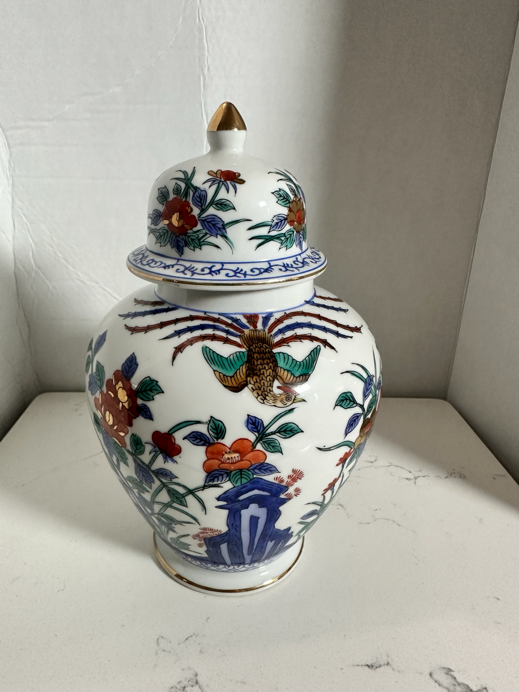 The Collected Chapter vintage Macau porcelain ginger jar with hand-painted phoenix, floral motifs, and gold accents.