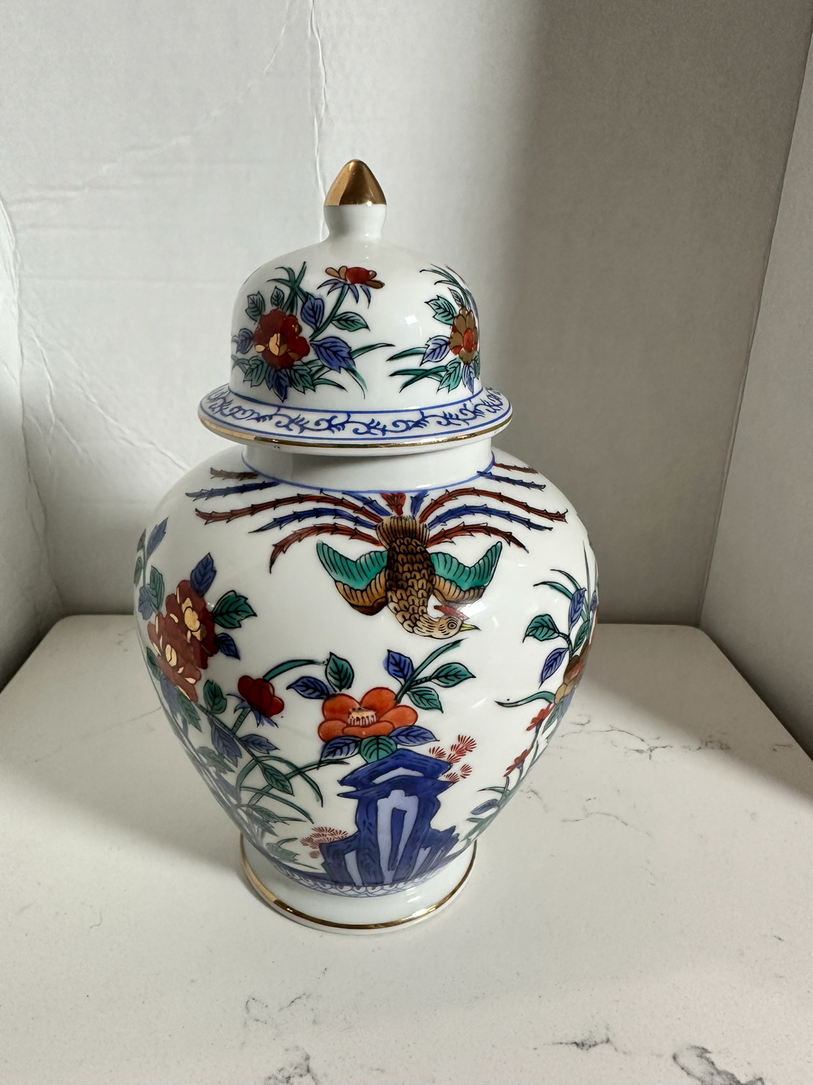 The Collected Chapter vintage Macau porcelain ginger jar with hand-painted phoenix, floral motifs, and gold accents.