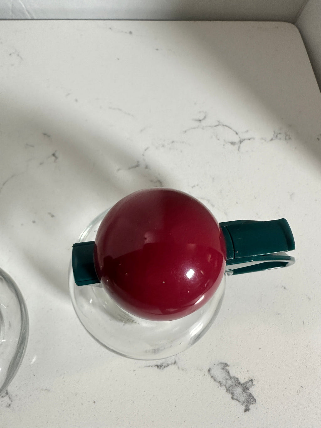 The Collected Chapter vintage STOHA Germany glass condiment server with a teal handle and red domed lid