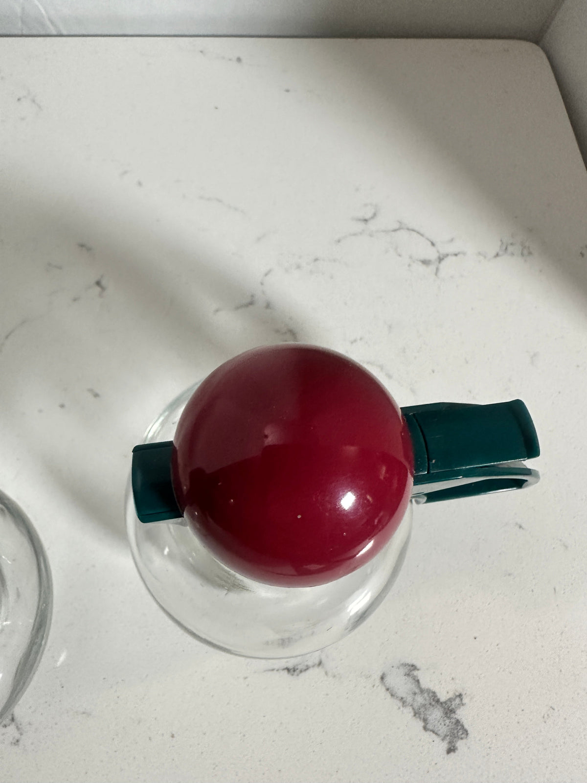 The Collected Chapter vintage STOHA Germany glass condiment server with a teal handle and red domed lid