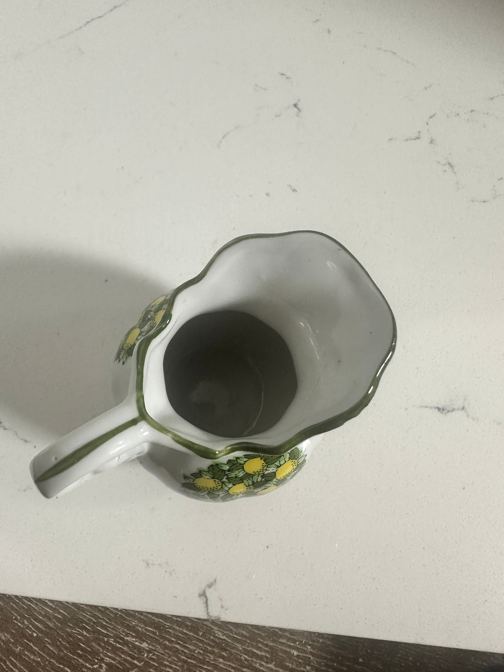 The Collected Chapter vintage porcelain miniature pitcher with lemon motif and green scalloped rim, top-down view