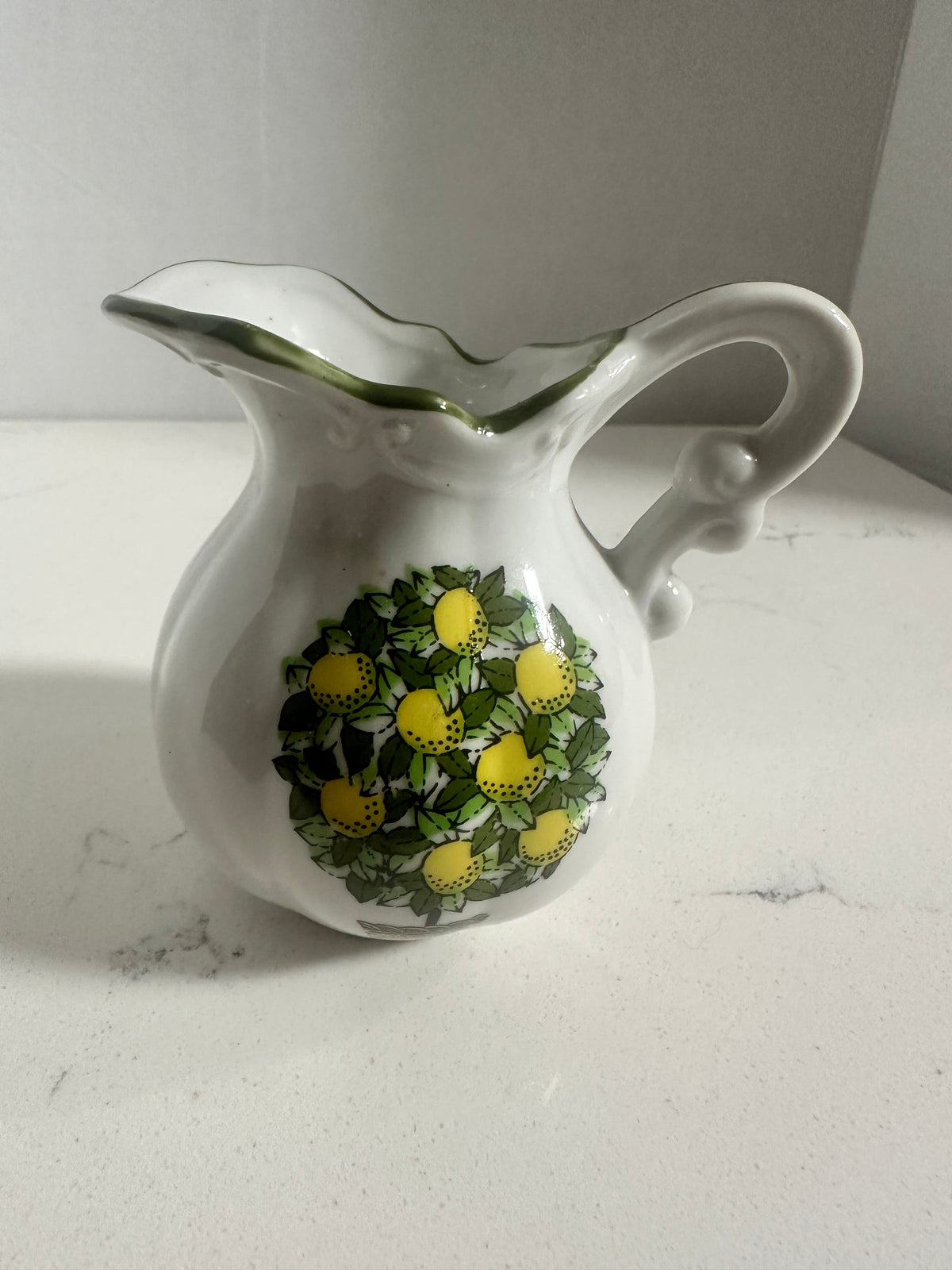 The Collected Chapter vintage porcelain miniature pitcher with lemon motif and green scalloped rim