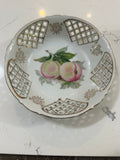 The Collected Chapter vintage UCAGCO China porcelain fruit bowl with peach motif, gold lattice, and scalloped edge.