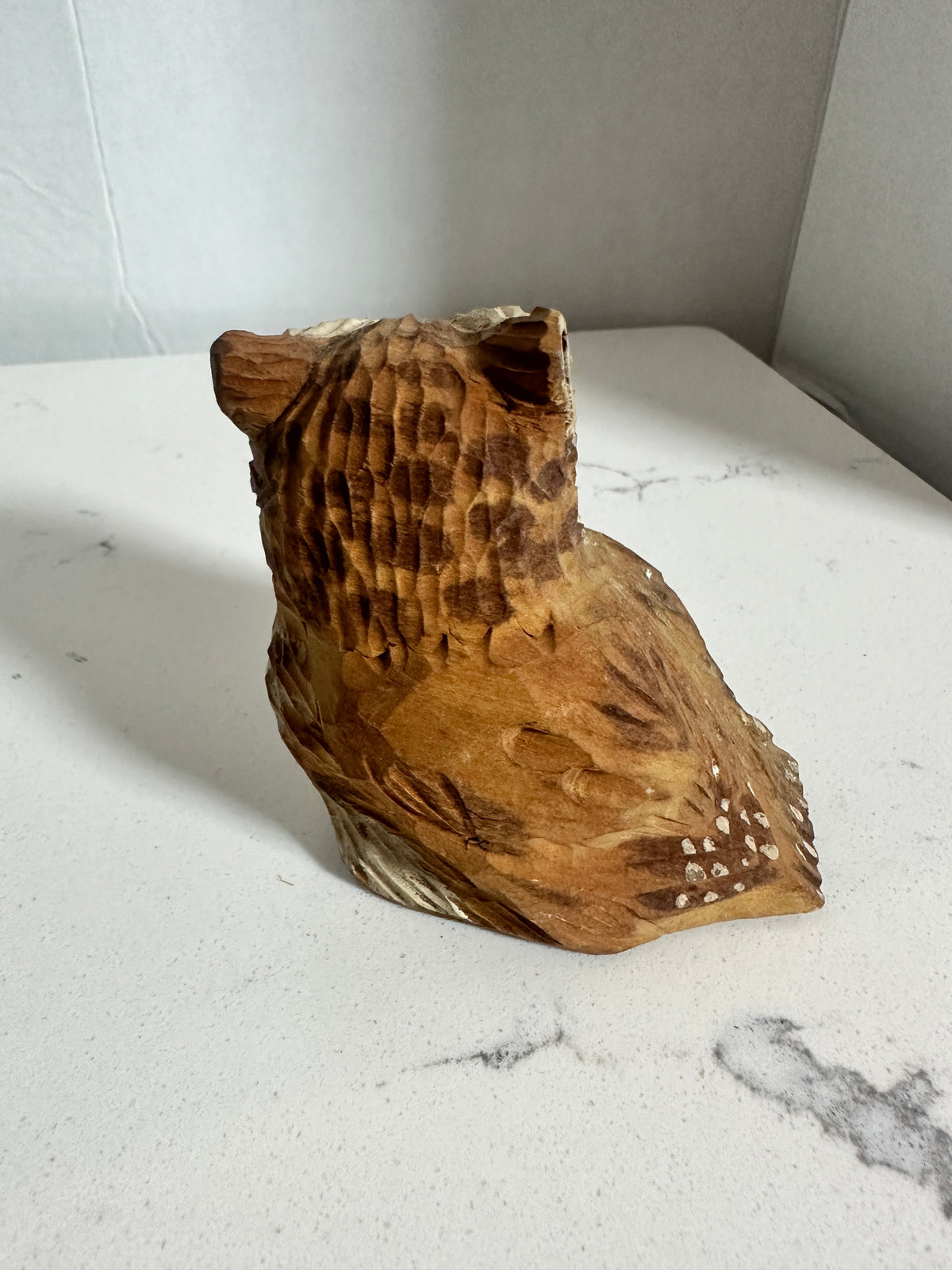 The Collected Chapter vintage hand-carved wooden owl figurine with detailed feather texture and rustic brown finish.